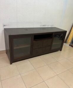 A television unit with a dark espresso-colored finish on solid mahogany wood and antique card catalog-style drawer pulls. - Image 4