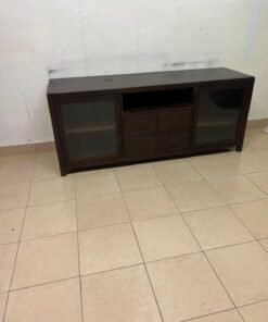 A television unit with a dark espresso-colored finish on solid mahogany wood and antique card catalog-style drawer pulls. - Image 5