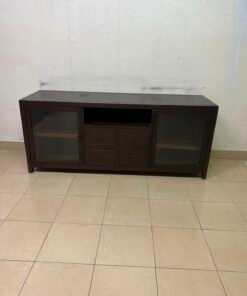 A television unit with a dark espresso-colored finish on solid mahogany wood and antique card catalog-style drawer pulls. - Image 10