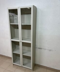 A bookcase with a glass door from IKEA, specifically from the BILLY/OXBERG series in white. - Image 3