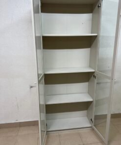 A bookcase with a glass door from IKEA, specifically from the BILLY/OXBERG series in white. - Image 4