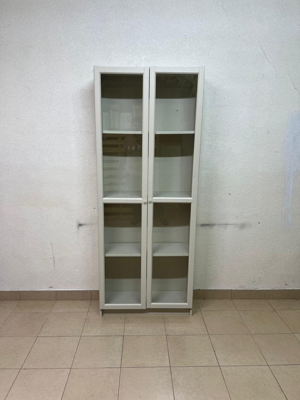 A bookcase with a glass door from IKEA, specifically from the BILLY/OXBERG series in white. - Image 6
