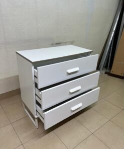 White chest of drawers with three drawers and metal legs with a connected frame. - Image 7