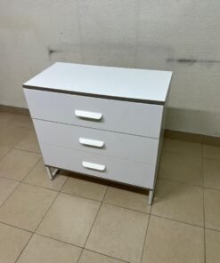White chest of drawers with three drawers and metal legs with a connected frame. - Image 11