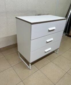 White chest of drawers with three drawers and metal legs with a connected frame. - Image 2