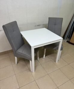 A square white dining table with two chairs - Image 8