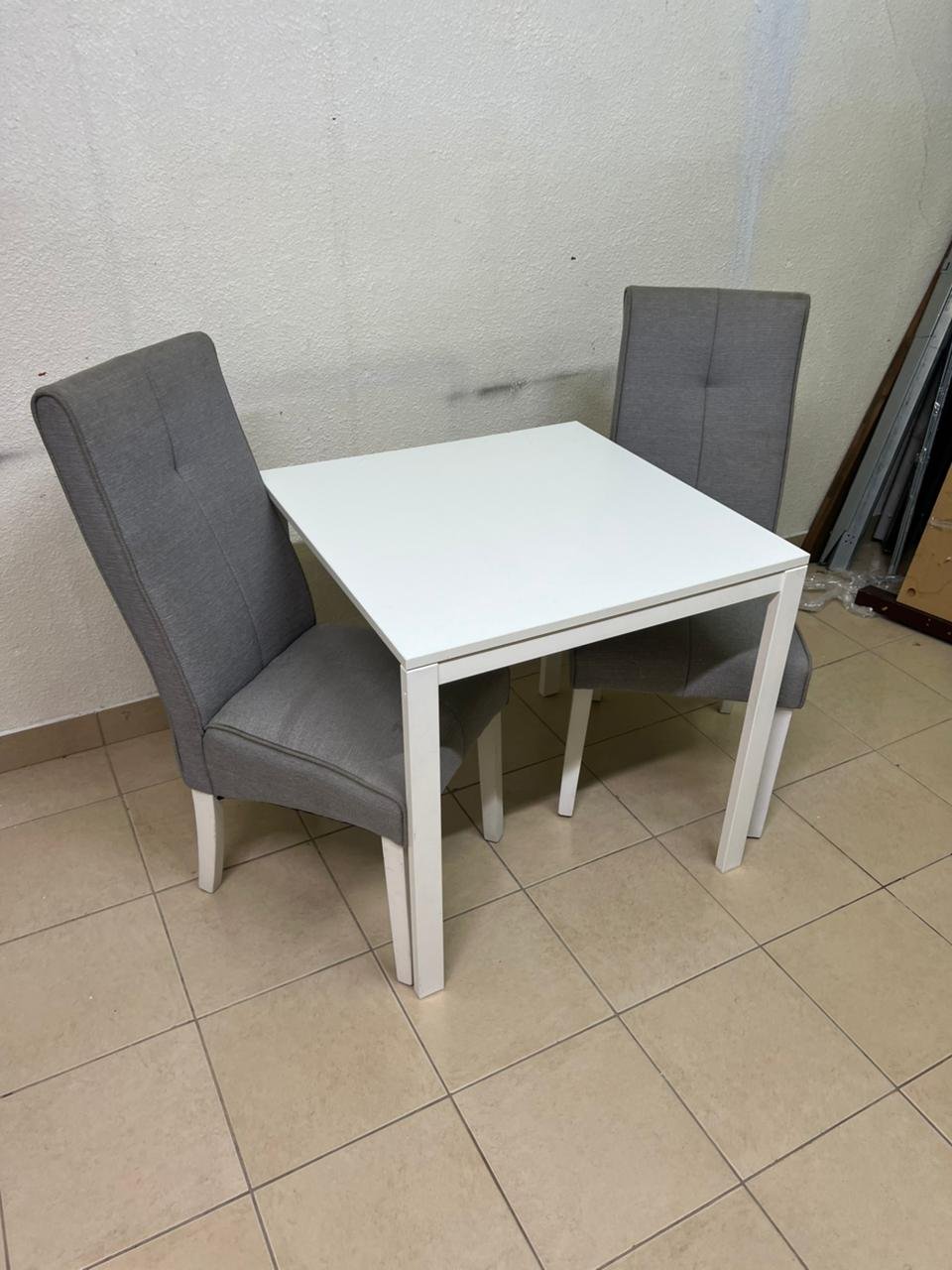 A square white dining table with two chairs - Image 8