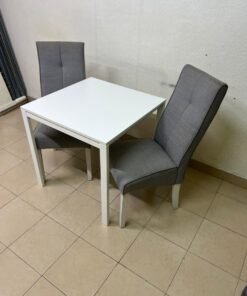 A square white dining table with two chairs - Image 3