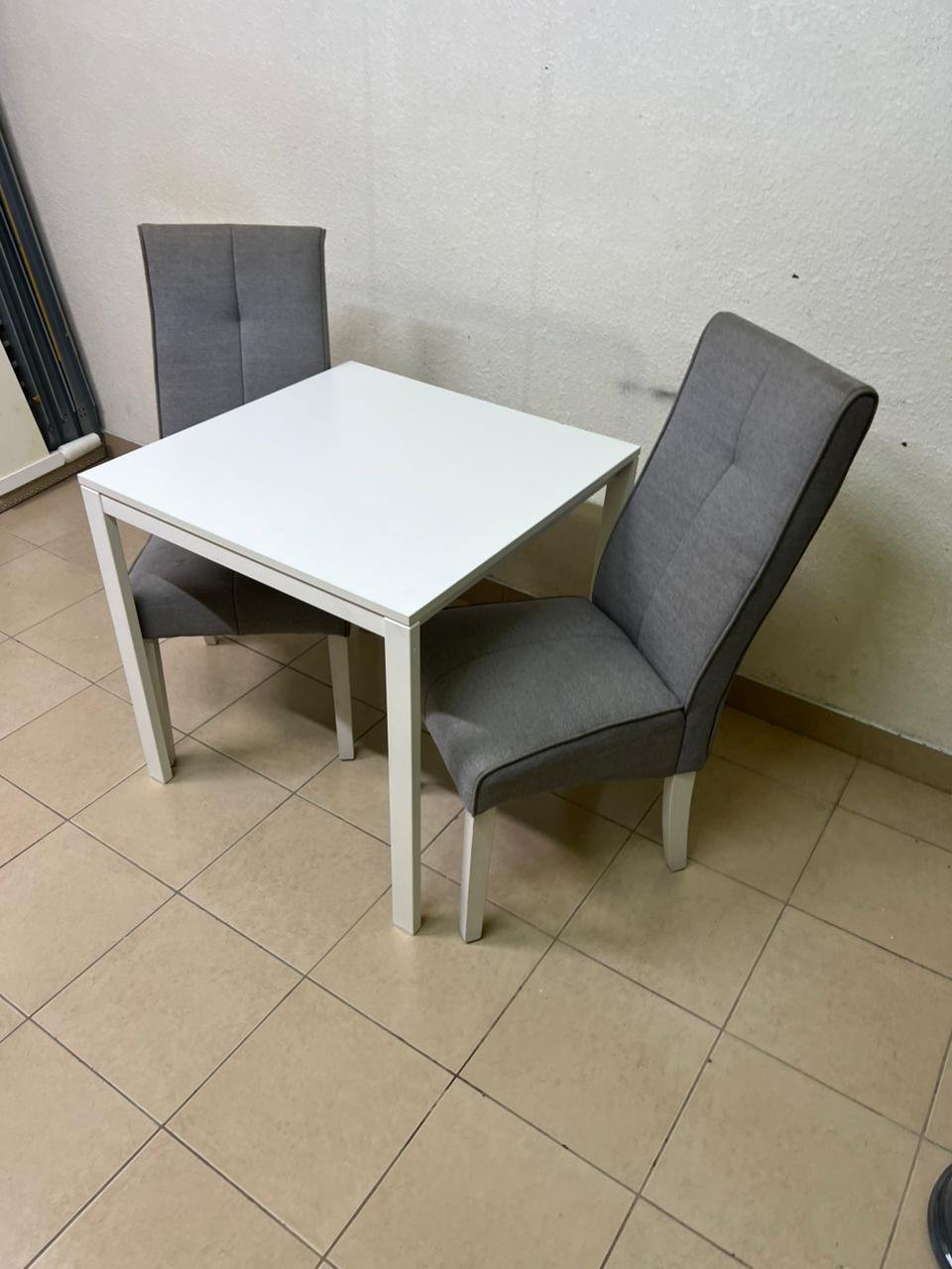 A square white dining table with two chairs - Image 3