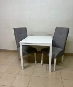 A square white dining table with two chairs - Image 4