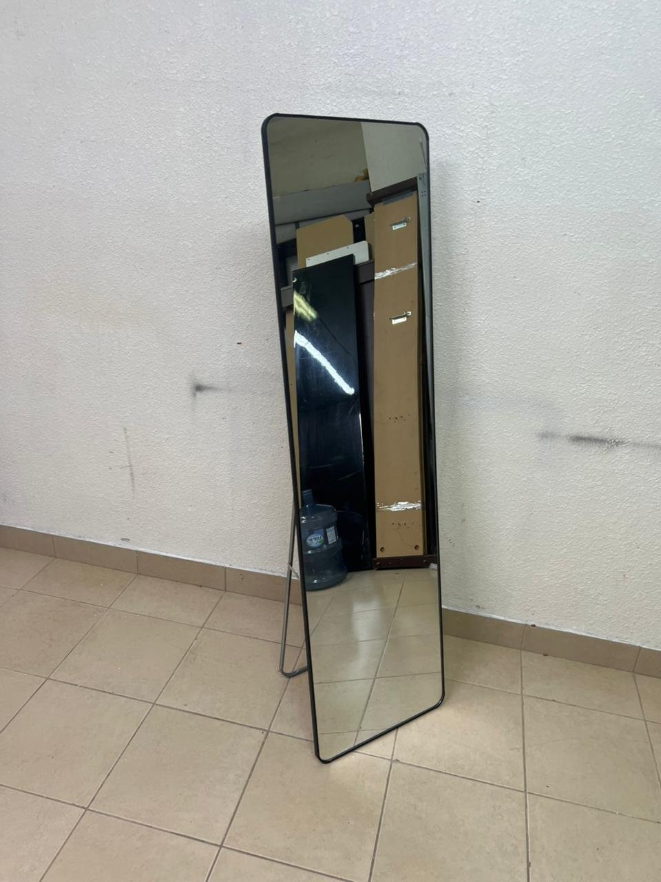 A tall, modern floor mirror featuring a slim black frame and elegant rounded corners. - Image 9