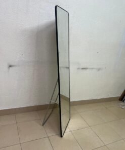 A tall, modern floor mirror featuring a slim black frame and elegant rounded corners. - Image 3