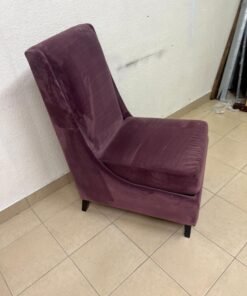 This is an armless side chair covered in warm purple velvet fabric with dark wooden legs. - Image 3