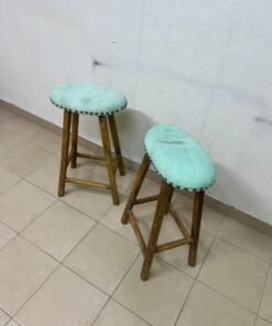 Two wooden bar stools with oval seats upholstered in light turquoise fabric and decorated with nail-like edges. - Image 2