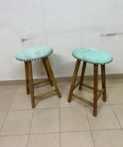 Two wooden bar stools with oval seats upholstered in light turquoise fabric and decorated with nail-like edges. - Image 5