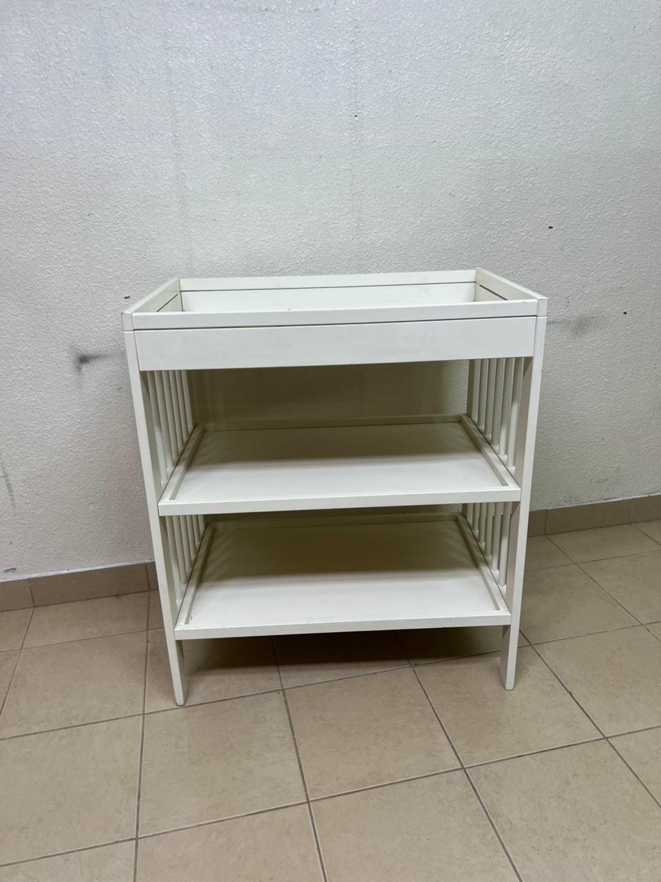 This GULLIVER table from IKEA comes in white and features practical storage shelves and a sturdy wooden design. - Image 9