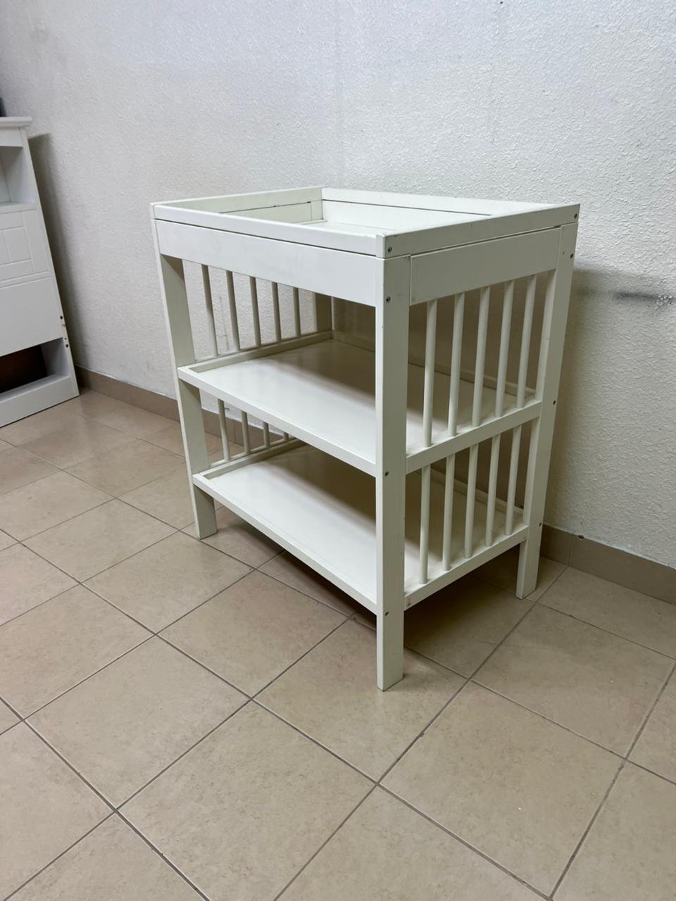This GULLIVER table from IKEA comes in white and features practical storage shelves and a sturdy wooden design. - Image 3