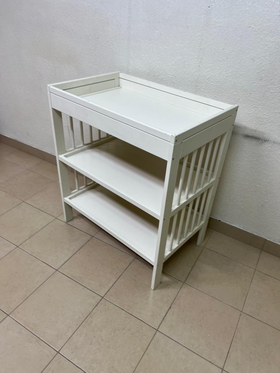 This GULLIVER table from IKEA comes in white and features practical storage shelves and a sturdy wooden design. - Image 4