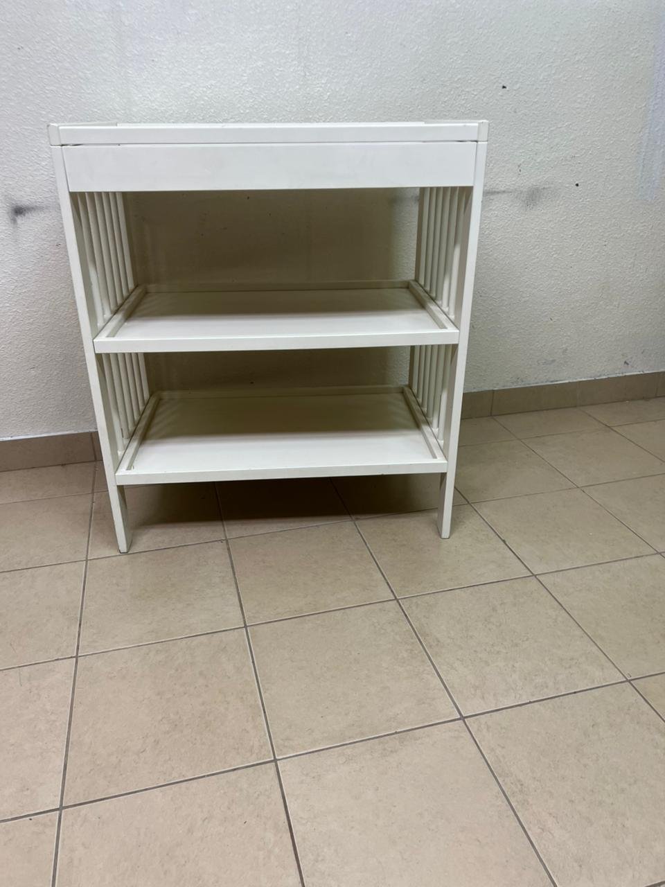 This GULLIVER table from IKEA comes in white and features practical storage shelves and a sturdy wooden design. - Image 5