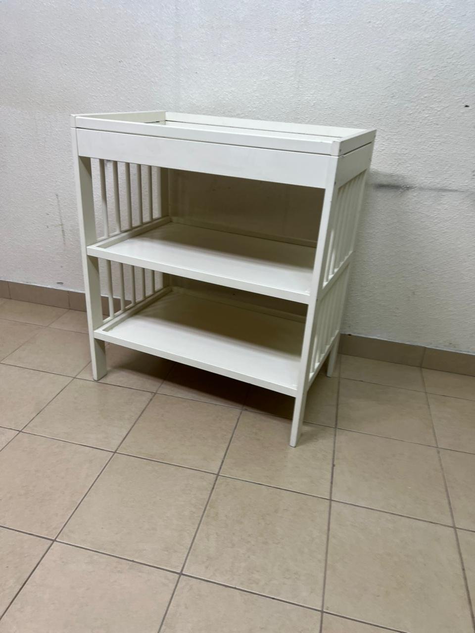 This GULLIVER table from IKEA comes in white and features practical storage shelves and a sturdy wooden design. - Image 8