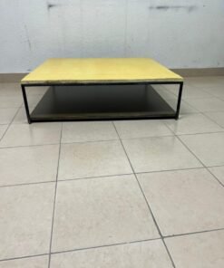 This is a square coffee table with an industrial design, featuring a black metal frame, a black pull-out drawer or lower shelf, and a light yellow wooden top. - Image 7