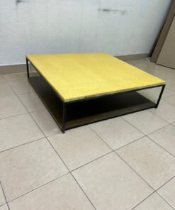 This is a square coffee table with an industrial design, featuring a black metal frame, a black pull-out drawer or lower shelf, and a light yellow wooden top. - Image 9