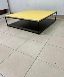 This is a square coffee table with an industrial design, featuring a black metal frame, a black pull-out drawer or lower shelf, and a light yellow wooden top. - Image 5
