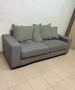 A gray fabric sofa with three seats and a rectangular design, equipped with four olive green back cushions. - Image 3