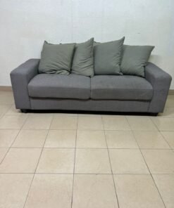 A gray fabric sofa with three seats and a rectangular design, equipped with four olive green back cushions. - Image 7