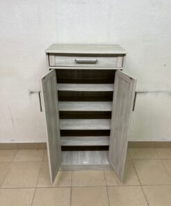 A wooden shoe cabinet (shoe rack) with a modern design in light gray or pale wood color, with two drawers or two doors with slides (slide doors) and a top handle for a small drawer. - Image 8