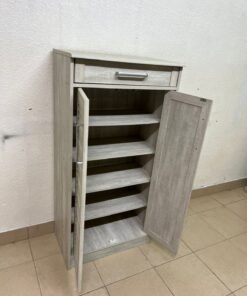 A wooden shoe cabinet (shoe rack) with a modern design in light gray or pale wood color, with two drawers or two doors with slides (slide doors) and a top handle for a small drawer. - Image 9