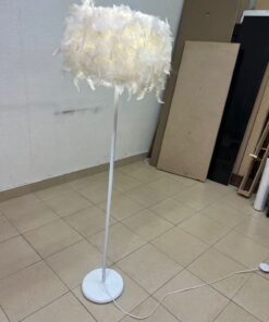 A modern floor lamp featuring a stylish cylindrical shade made of soft white feathers with a white metal base and pole. - Image 7