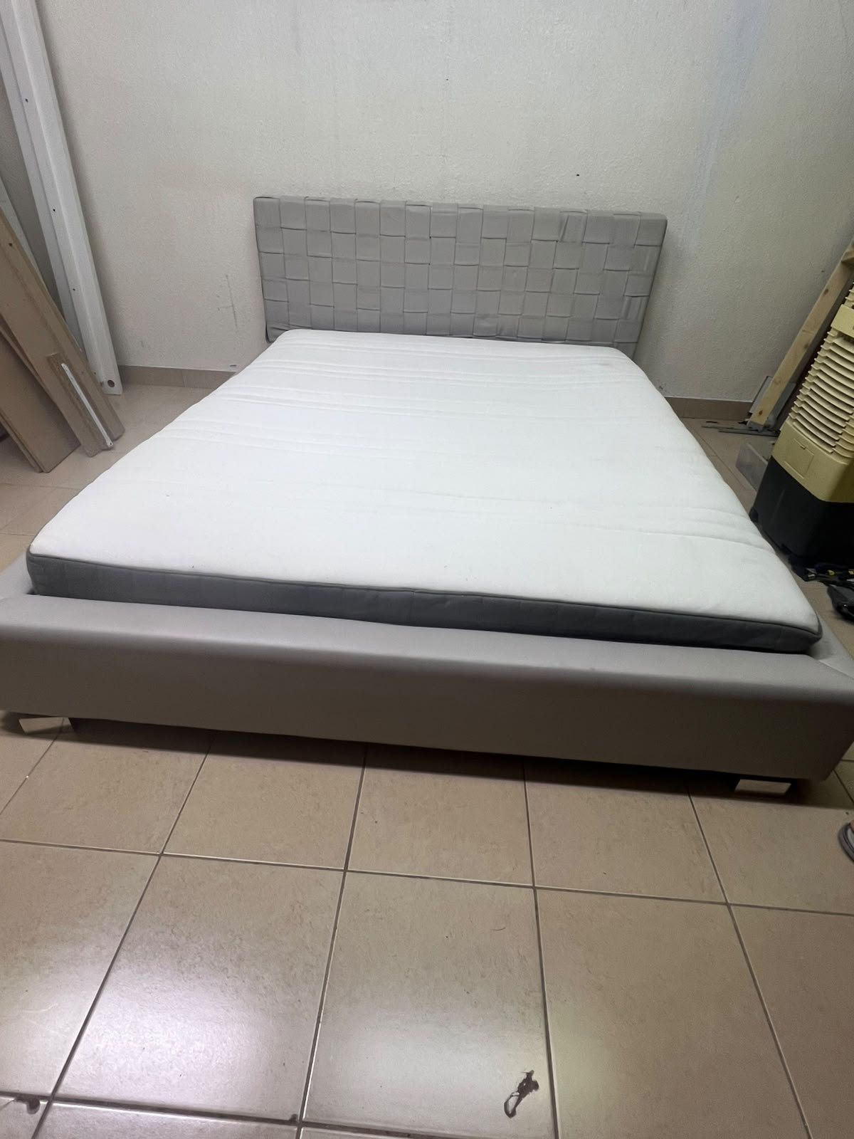 Grey double bed frame with upholstered design and distinctive headboard. - Image 2