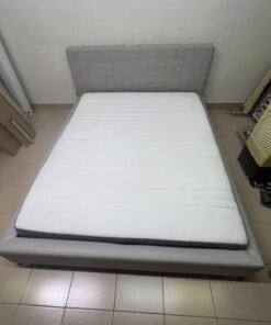 Grey double bed frame with upholstered design and distinctive headboard. - Image 4