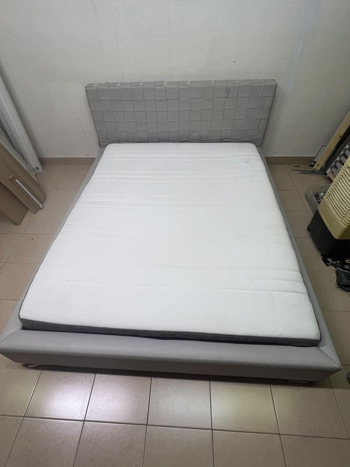 Grey double bed frame with upholstered design and distinctive headboard. - Image 4