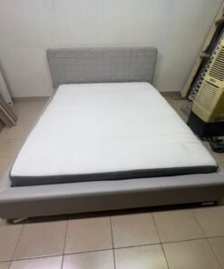 Grey double bed frame with upholstered design and distinctive headboard. - Image 5