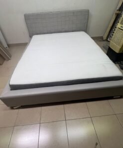 Grey double bed frame with upholstered design and distinctive headboard. - Image 6