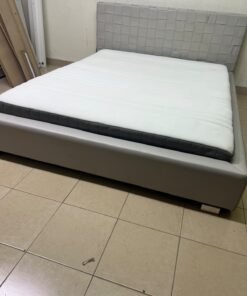 Grey double bed frame with upholstered design and distinctive headboard. - Image 8