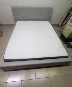 Grey double bed frame with upholstered design and distinctive headboard. - Image 9