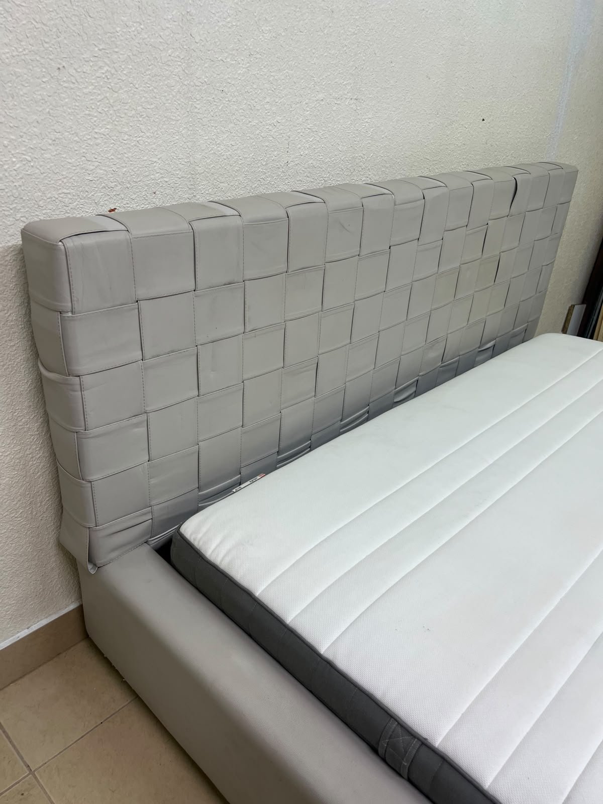 Grey double bed frame with upholstered design and distinctive headboard. - Image 12