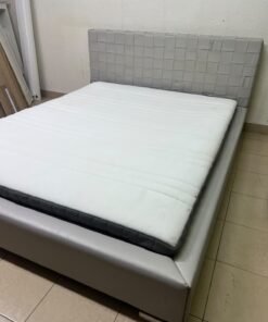 Grey double bed frame with upholstered design and distinctive headboard. - Image 13