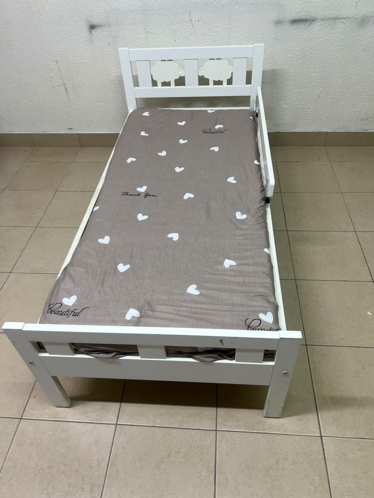 A white wooden cot, believed to be the KRITTER model from IKEA UAE, measuring approximately 70 x 160 cm, and comes with a side guard rail - Image 2