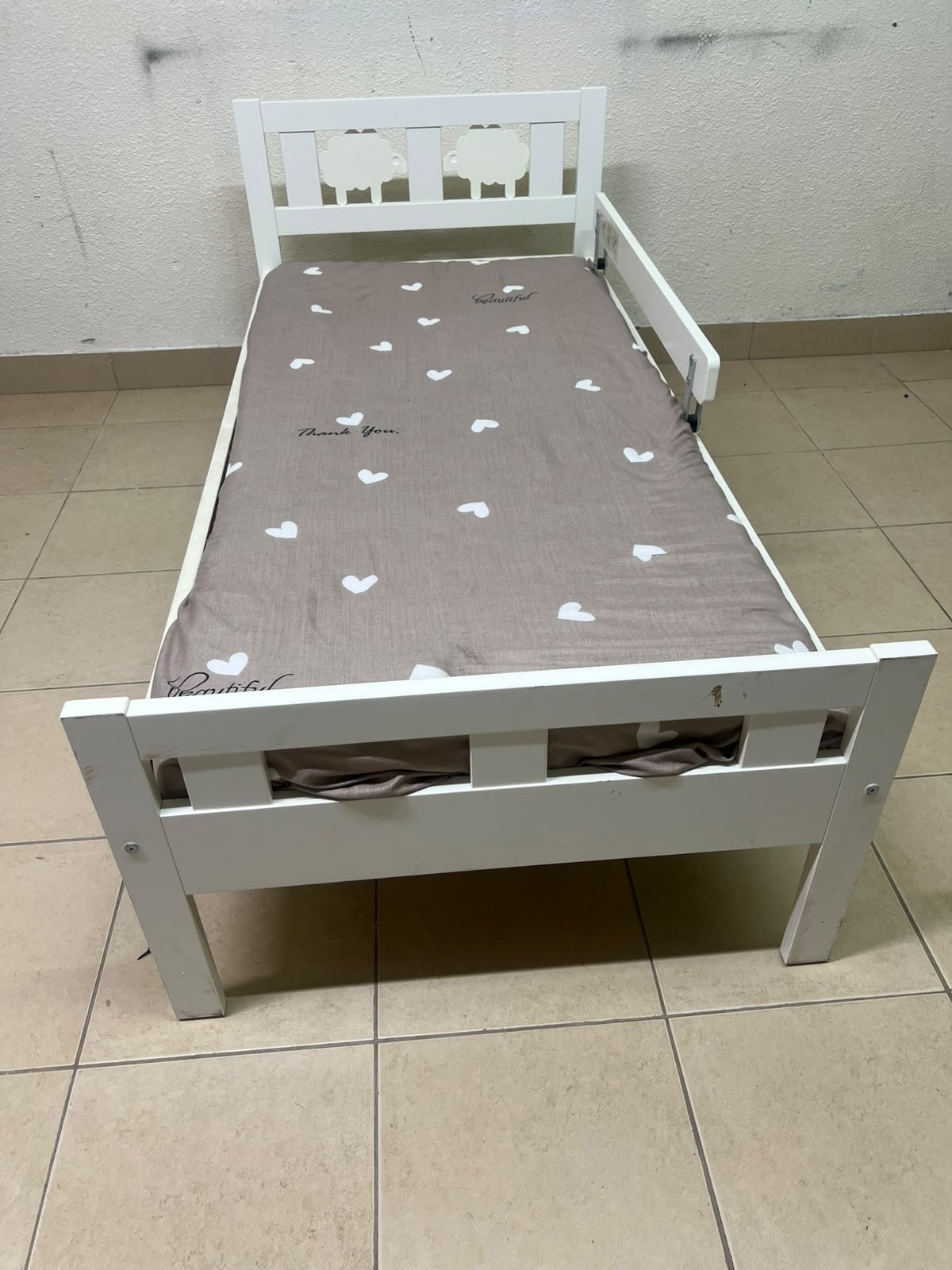 A white wooden cot, believed to be the KRITTER model from IKEA UAE, measuring approximately 70 x 160 cm, and comes with a side guard rail - Image 4