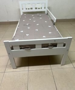A white wooden cot, believed to be the KRITTER model from IKEA UAE, measuring approximately 70 x 160 cm, and comes with a side guard rail - Image 5