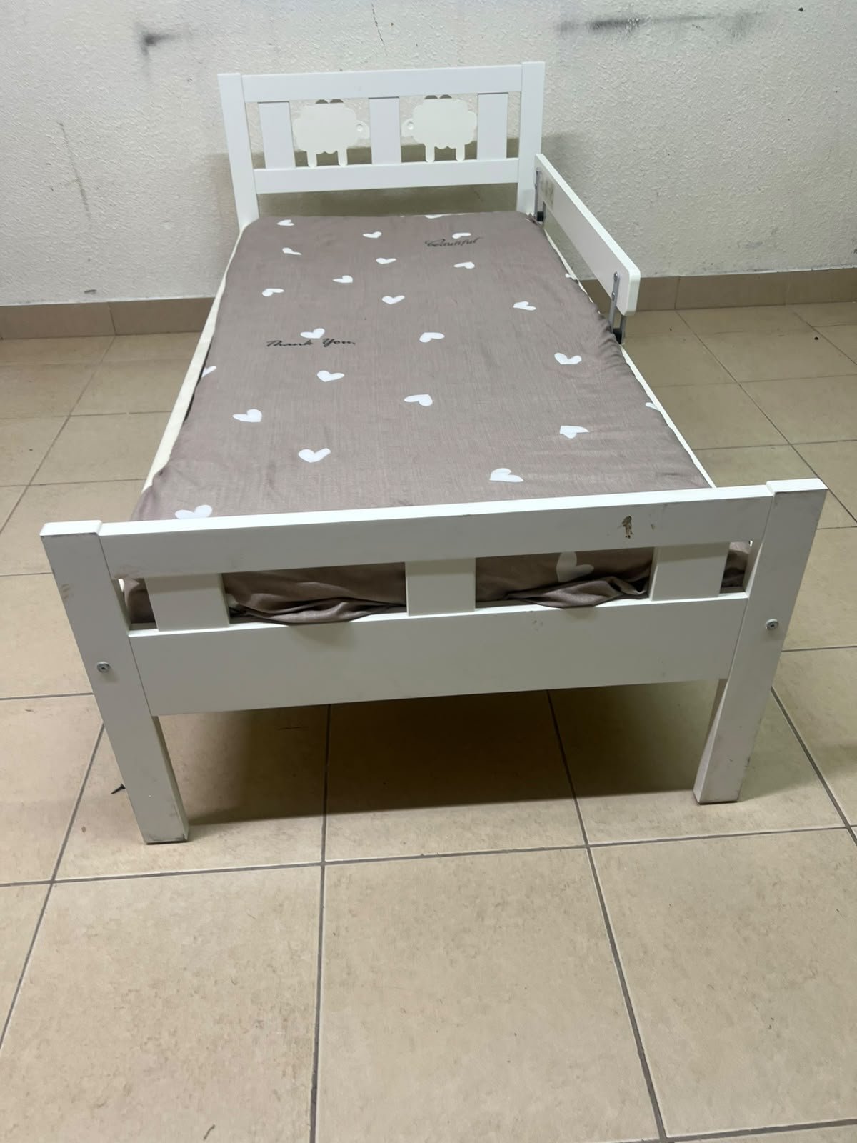 A white wooden cot, believed to be the KRITTER model from IKEA UAE, measuring approximately 70 x 160 cm, and comes with a side guard rail - Image 5