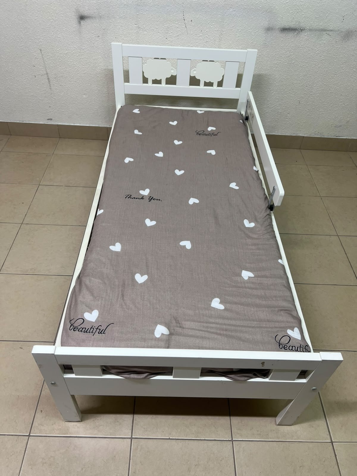 A white wooden cot, believed to be the KRITTER model from IKEA UAE, measuring approximately 70 x 160 cm, and comes with a side guard rail - Image 7
