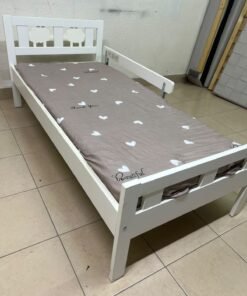 A white wooden cot, believed to be the KRITTER model from IKEA UAE, measuring approximately 70 x 160 cm, and comes with a side guard rail - Image 9