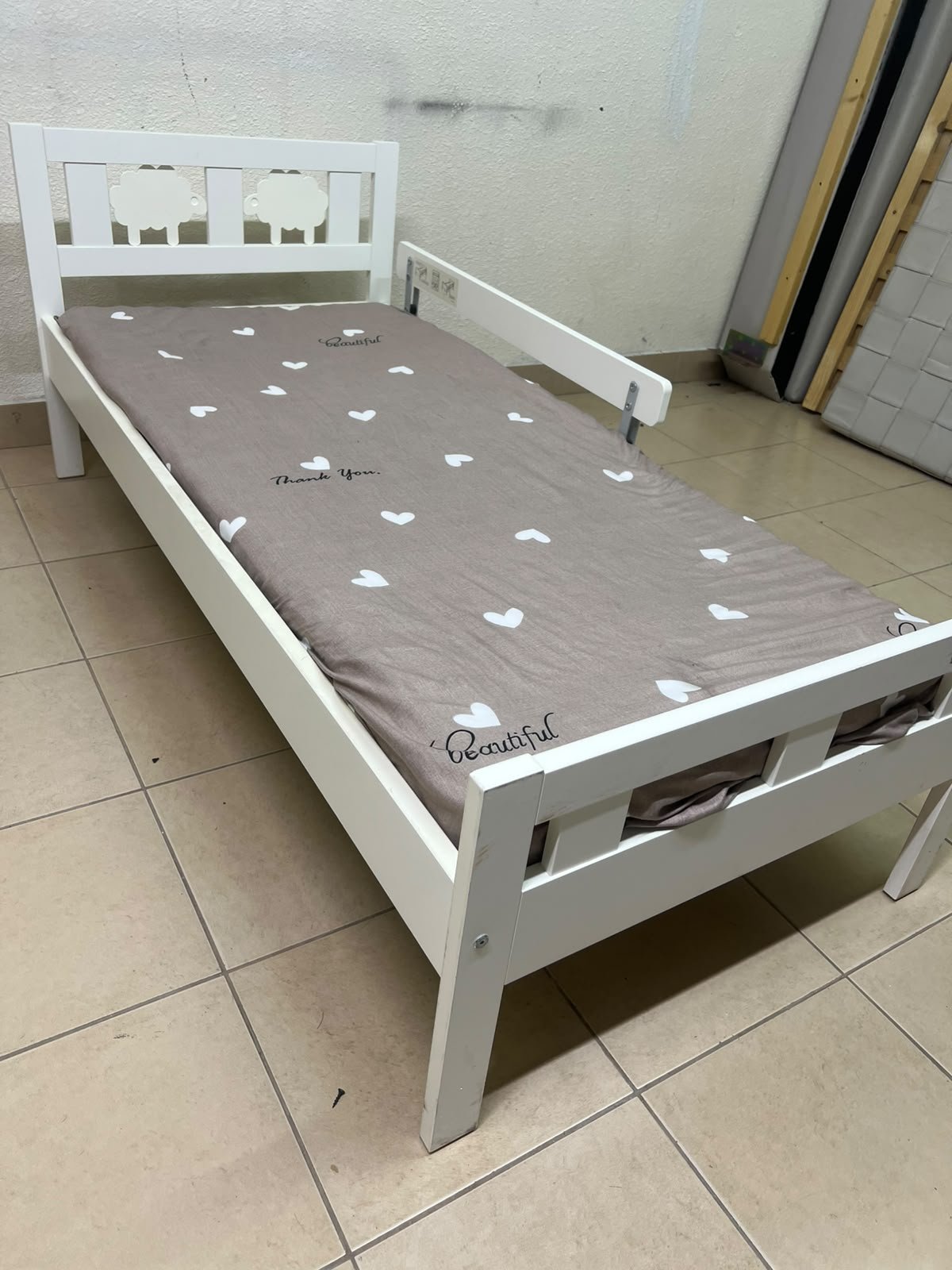 A white wooden cot, believed to be the KRITTER model from IKEA UAE, measuring approximately 70 x 160 cm, and comes with a side guard rail - Image 9