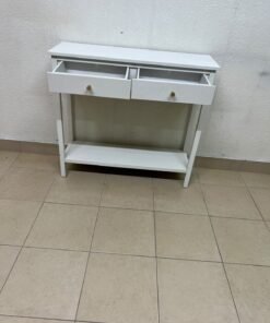 A modern white console table featuring two drawers with a striped front and small handles, as well as an open bottom shelf. - Image 3