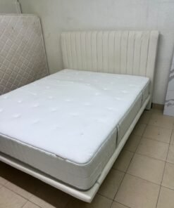 An upholstered double bed in white or light beige with a striped headboard, featuring a comfortable white mattress – Home Centre. - Image 7